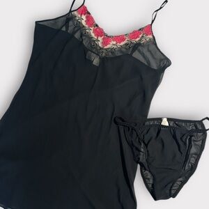 Black & pink lace slip dress with mesh top & lace details.